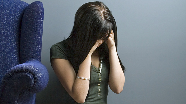 mental-health-woman-holding-head